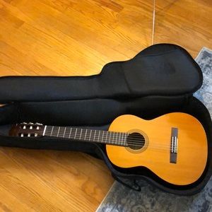 Youth sized Yamaha acoustic guitar - with case